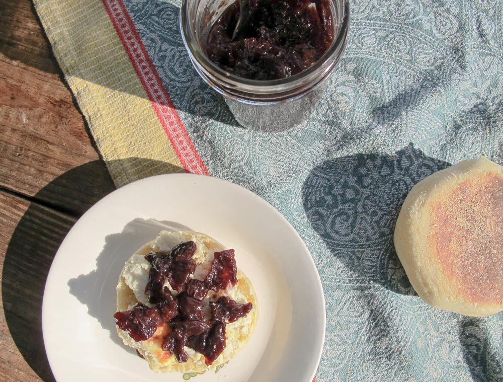 Baked ricotta on a homemade english muffin, topped with cherry chutney