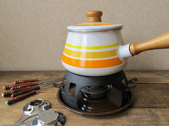 Wouldn't you be excited, too, if your fondue pot was this adorable? (Sorry to rub it in. This baby has sold.)