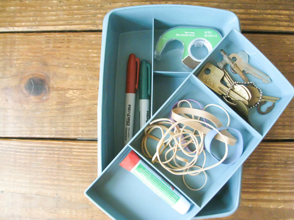 Vintage Tupperware with lots of compartments is great for organizing the junk drawer—fill the compartments with office supplies, pens, keys and other odds and ends that don’t fit anywhere else